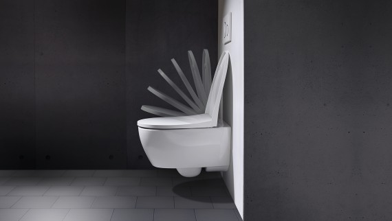 Couvercle de WC avec mécanisme d'abaissement automatique Couvercle de WC avec mécanisme d'abaissement automatique