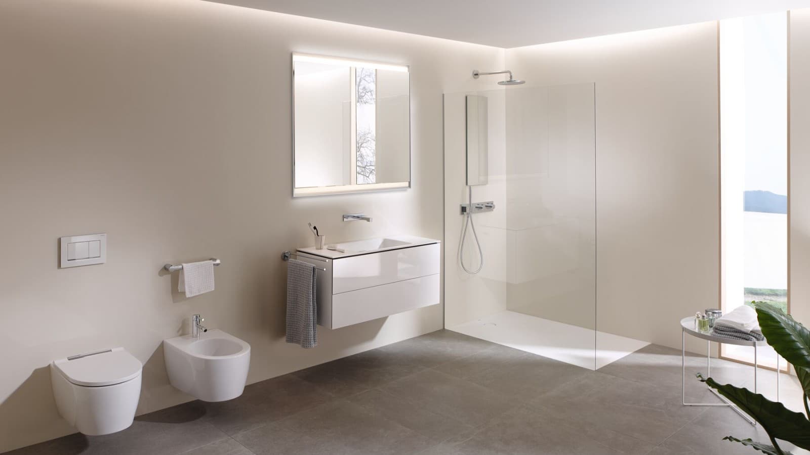 Grande salle de bains avec WC-douche Geberit AquaClean Mera, meubles et céramiques sanitaires (© Geberit) Grande salle de bains avec WC-douche Geberit AquaClean Mera, meubles et céramiques sanitaires (© Geberit)